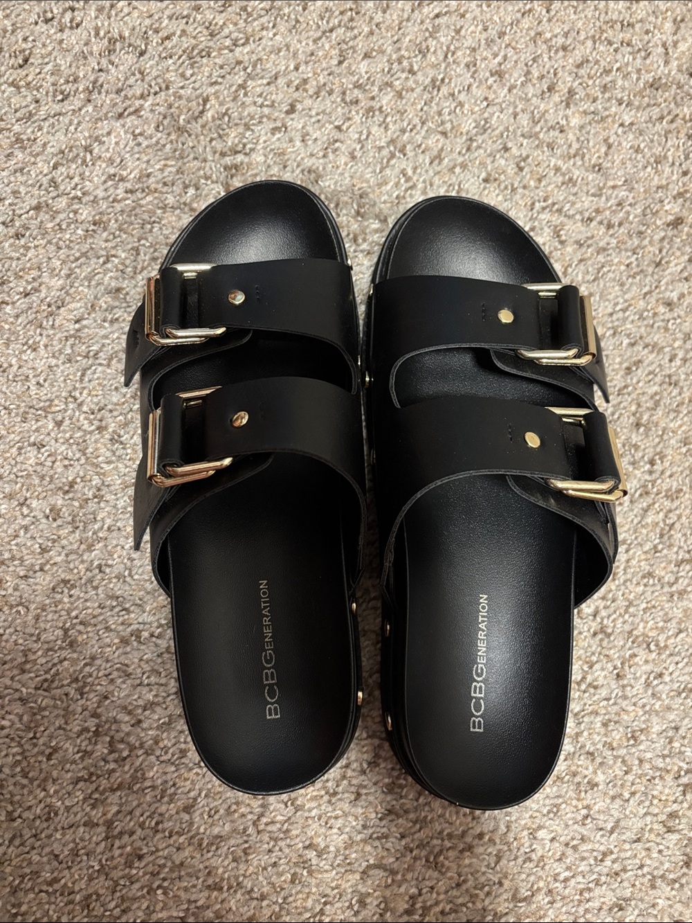BCBGeneration Black Slide Sandals with Gold Buckles